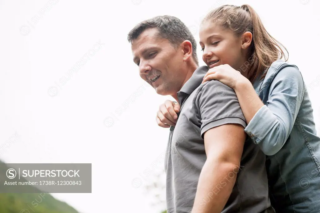 Father and daughter enjoying in a park