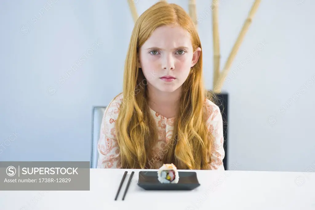 Portrait of a girl at a dining table