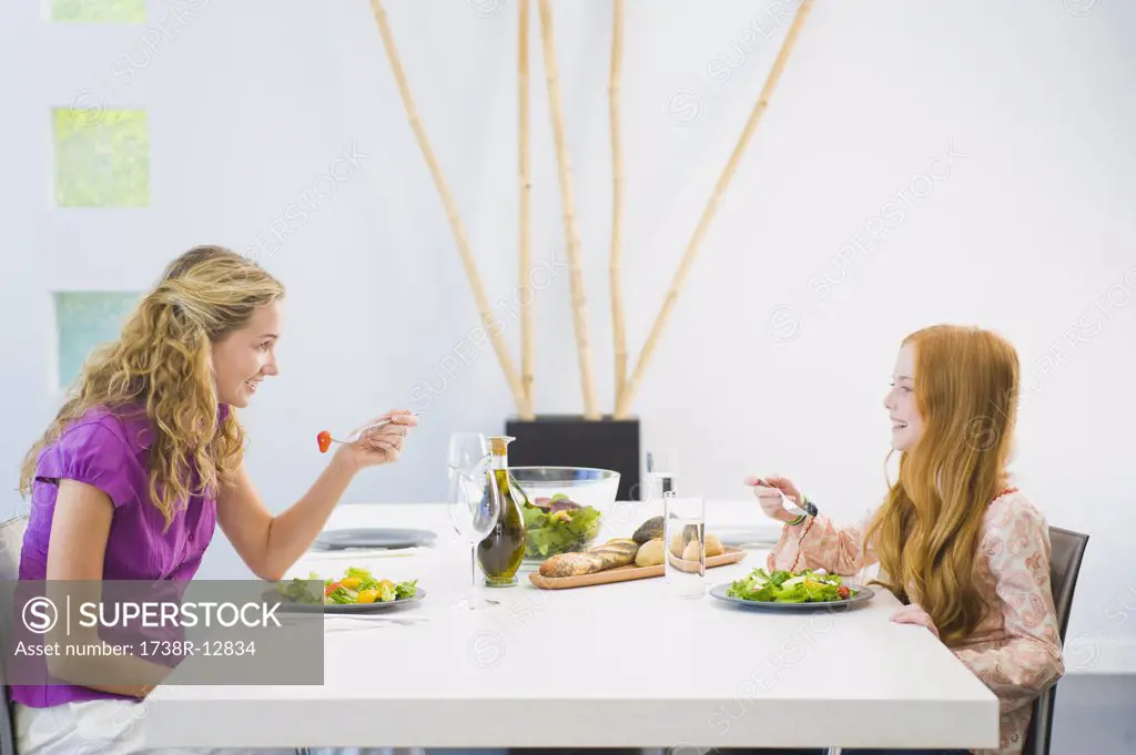 Woman having lunch with her daughter