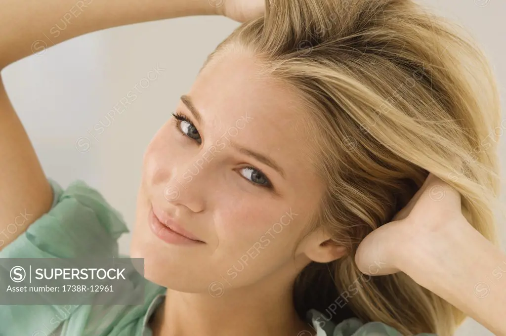 Woman with her hands in her hair