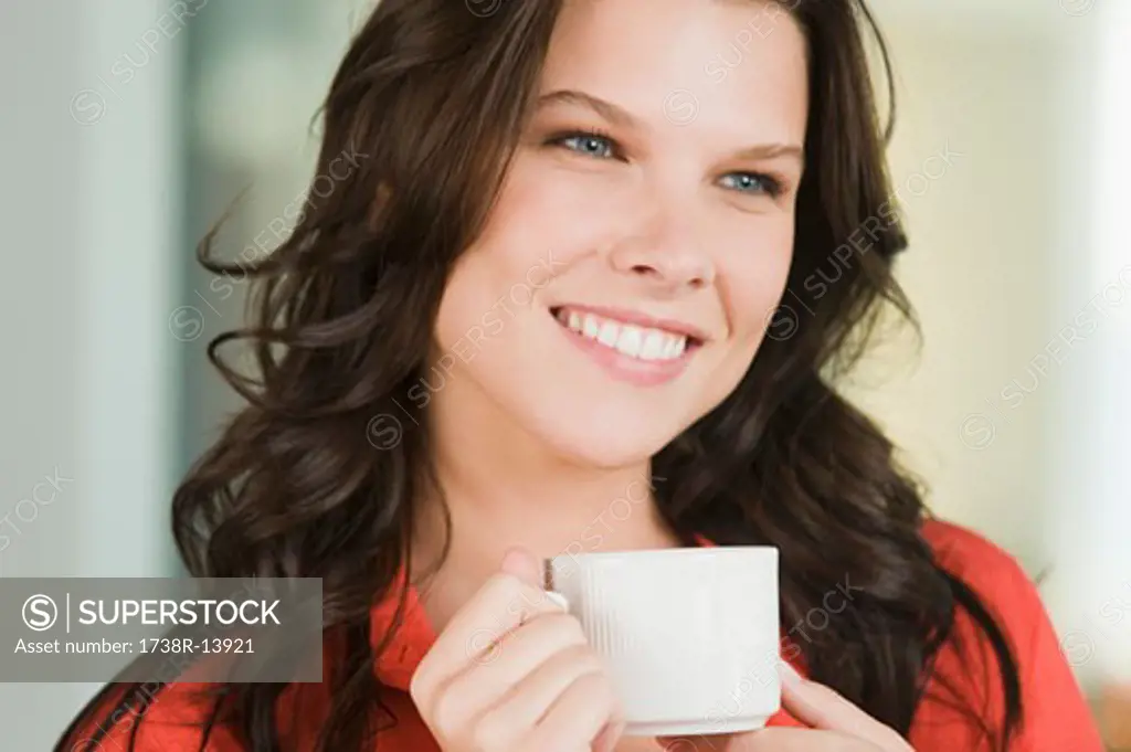 Close-up of a woman drinking coffee