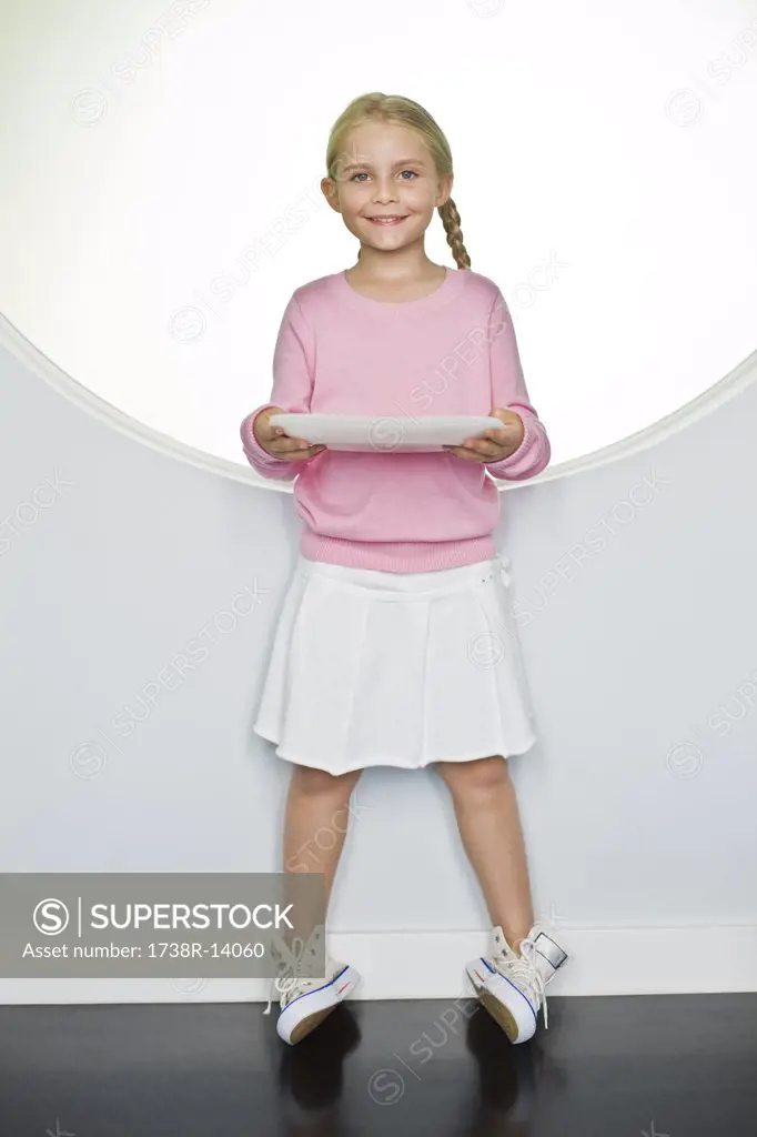 Girl holding a plate