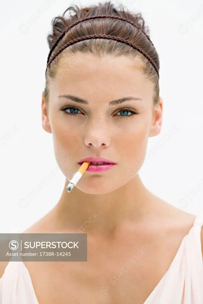 Portrait of a woman smoking a cigarette