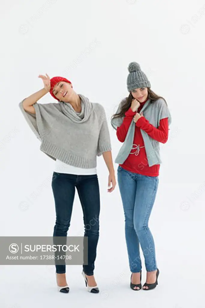 Two women standing in warm clothing