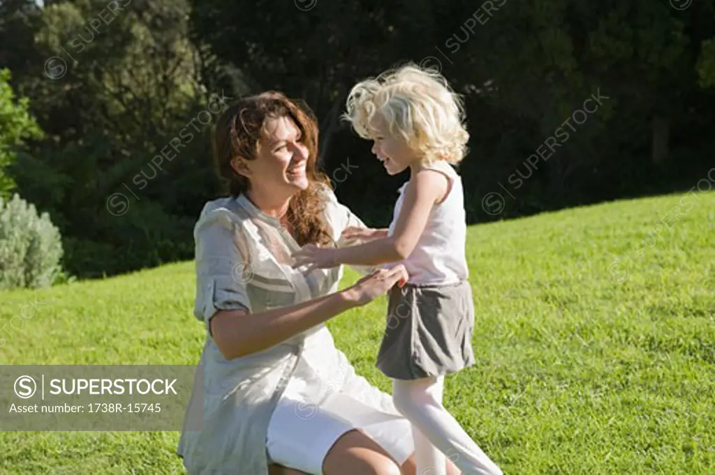 Woman playing with her daughter