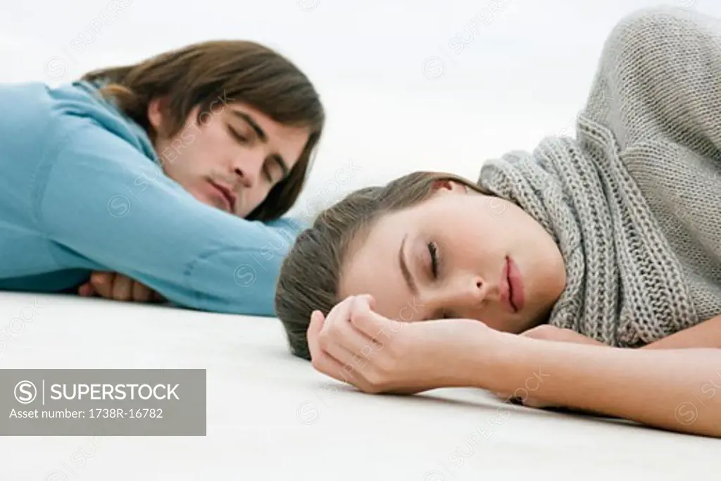 Couple resting on the floor