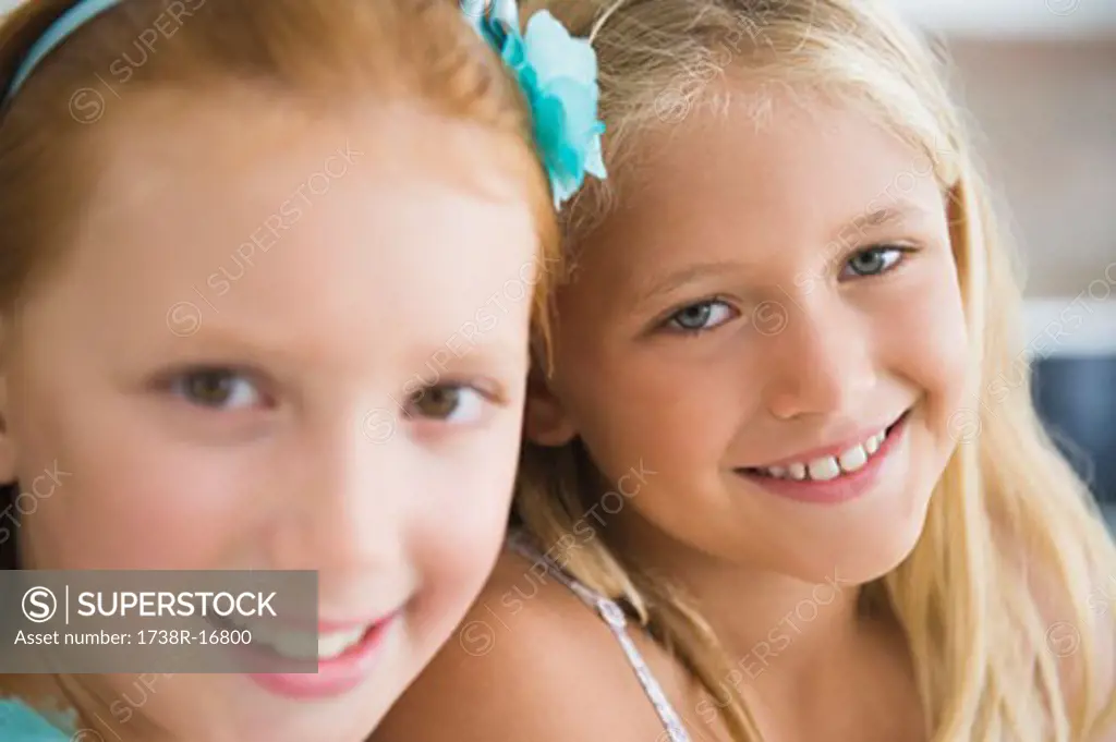 Portrait of two girls smiling