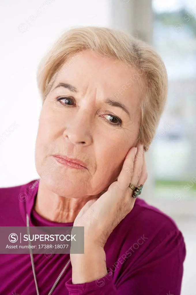 Close_up of a woman suffering from a toothache
