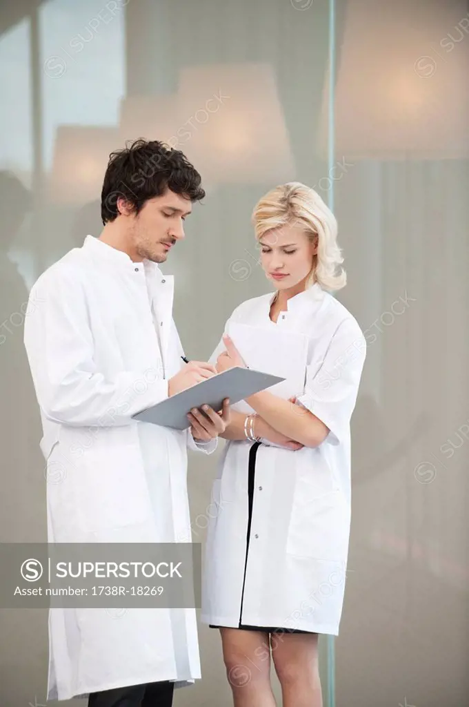 Doctors examining a medical report