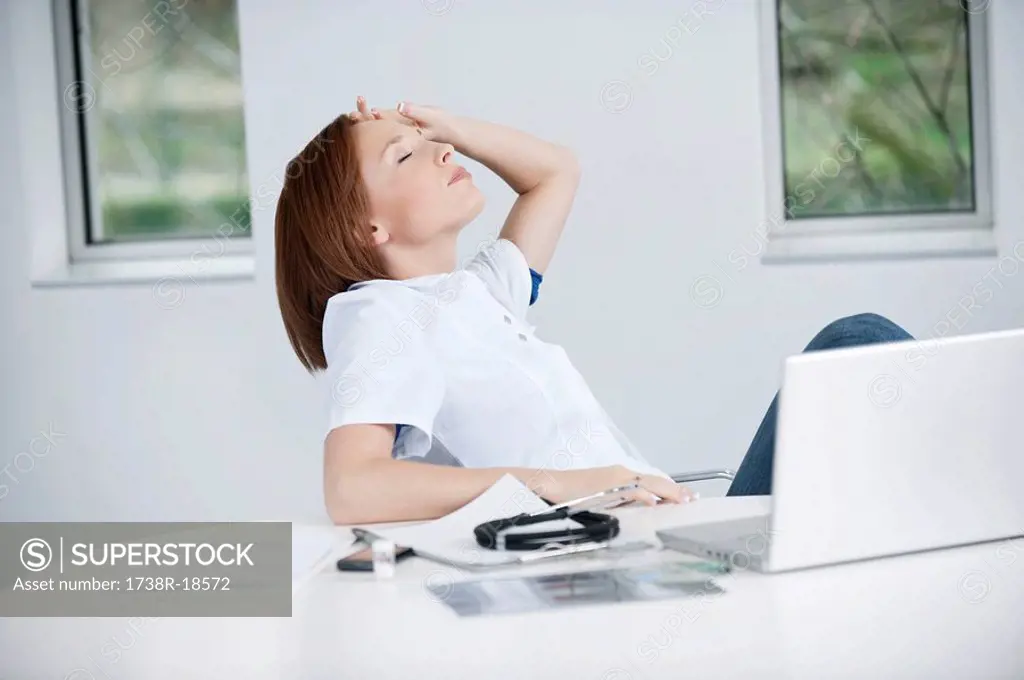 Female doctor resting in an office