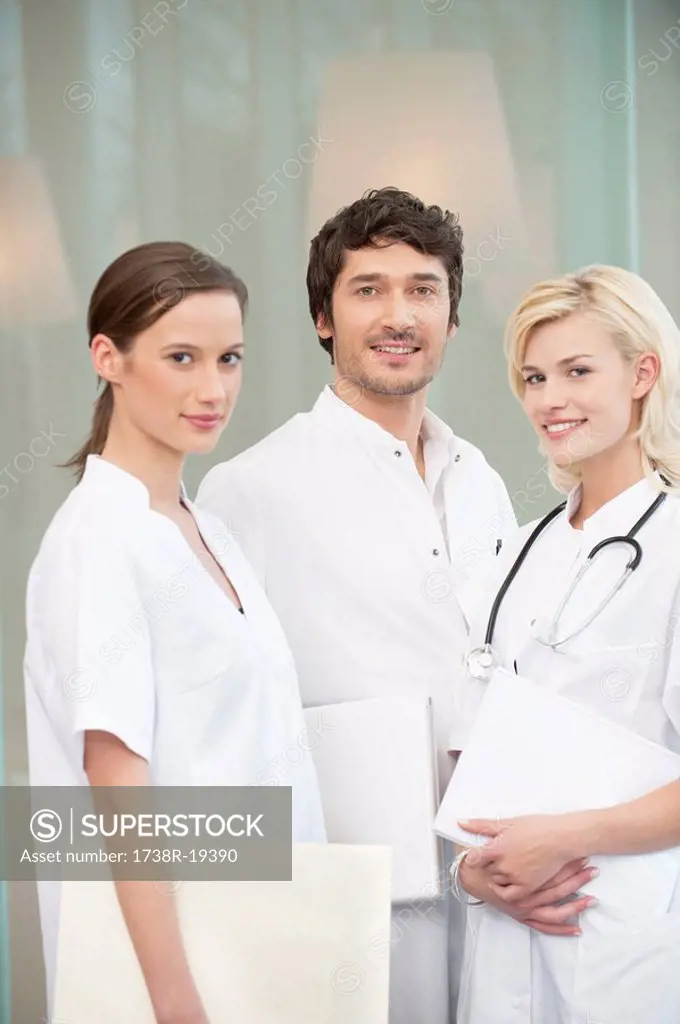 Portrait of three doctors smiling
