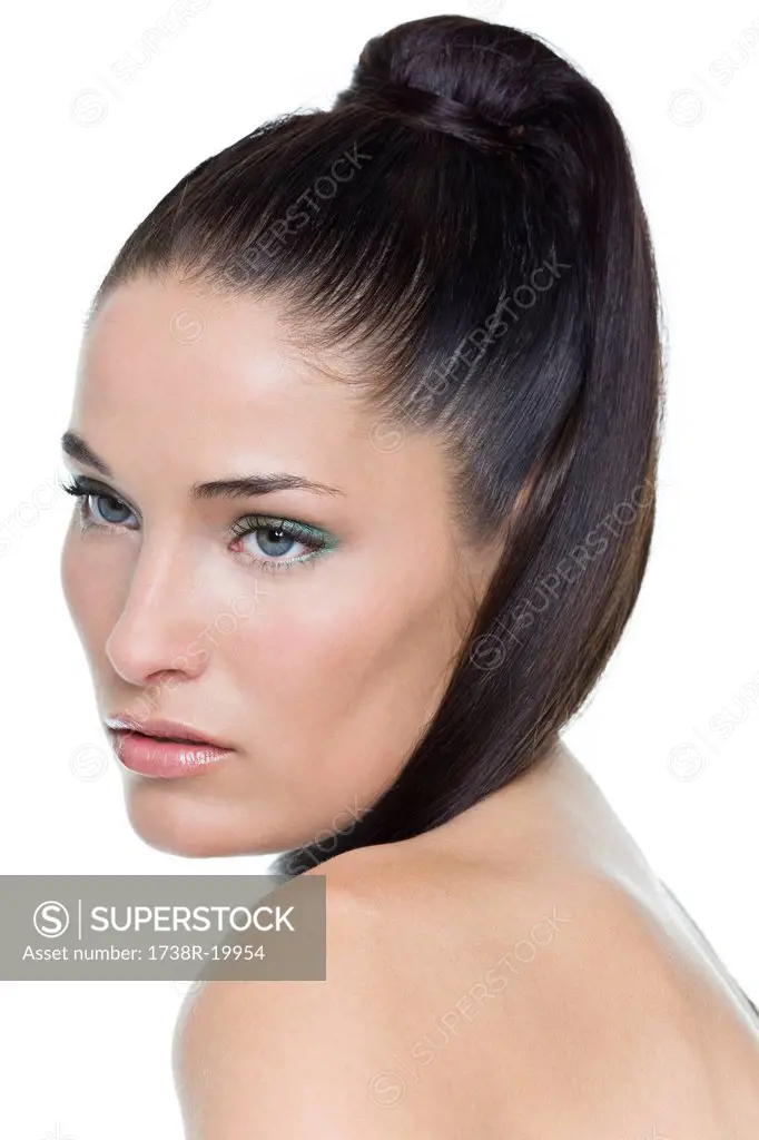 Young woman with long hair around neck