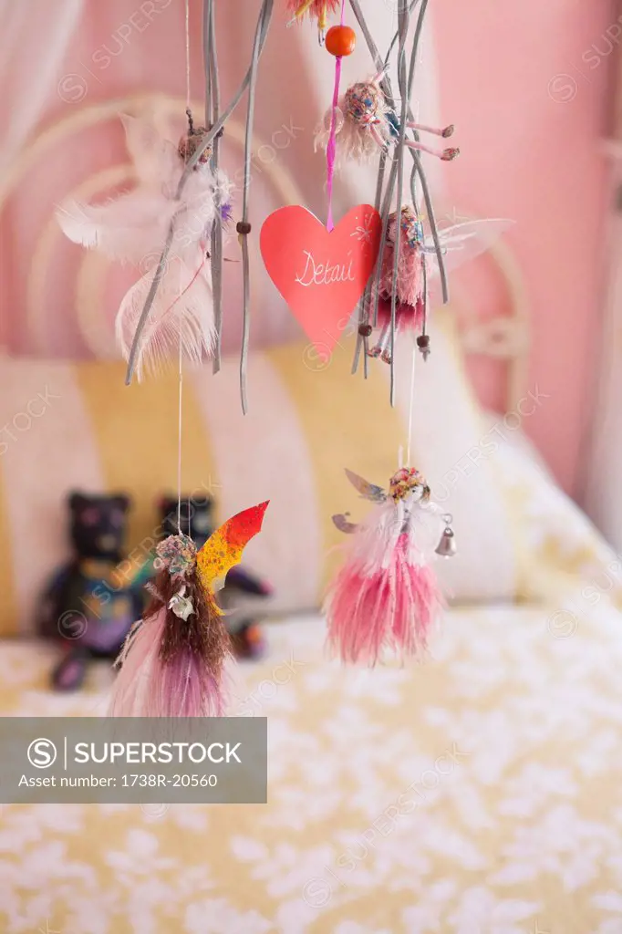 Close_up of wind chime decorated in a bedroom