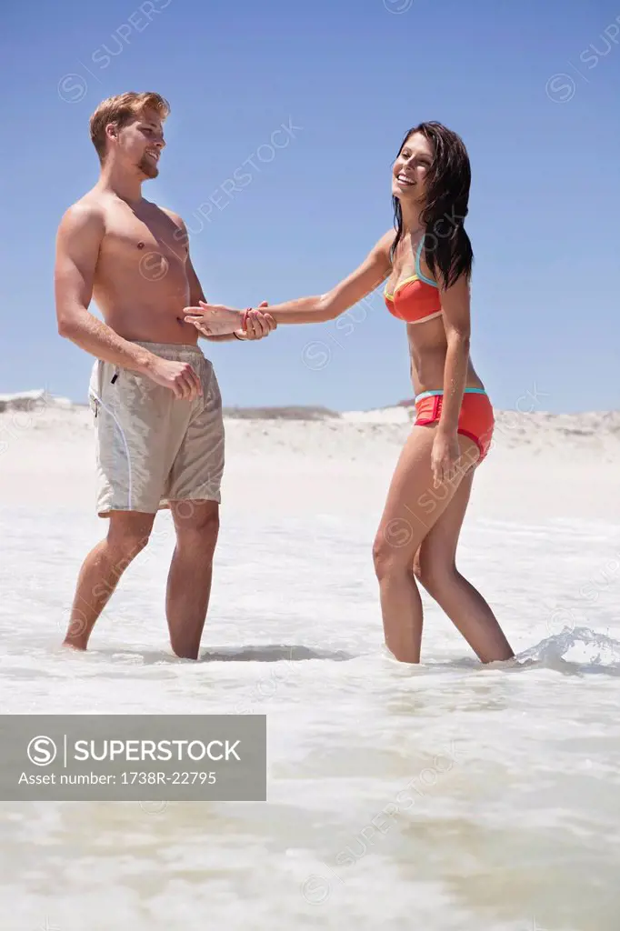 Couple enjoying on the beach
