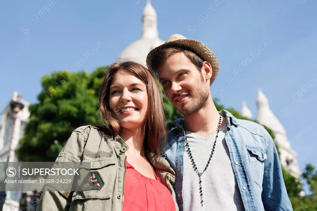 Low angle view of a couple smiling, Montmartre, Paris, Ile_de_France, France
