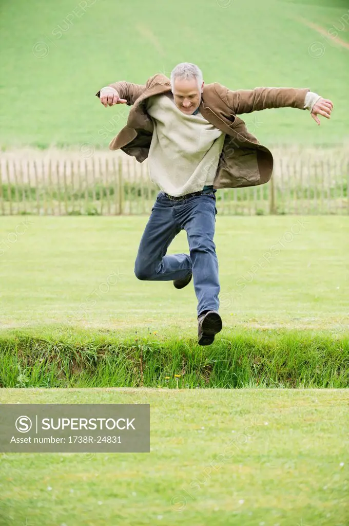 Man jumping in a field