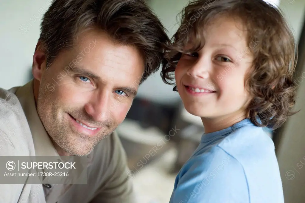 Portrait of a man with his son smiling