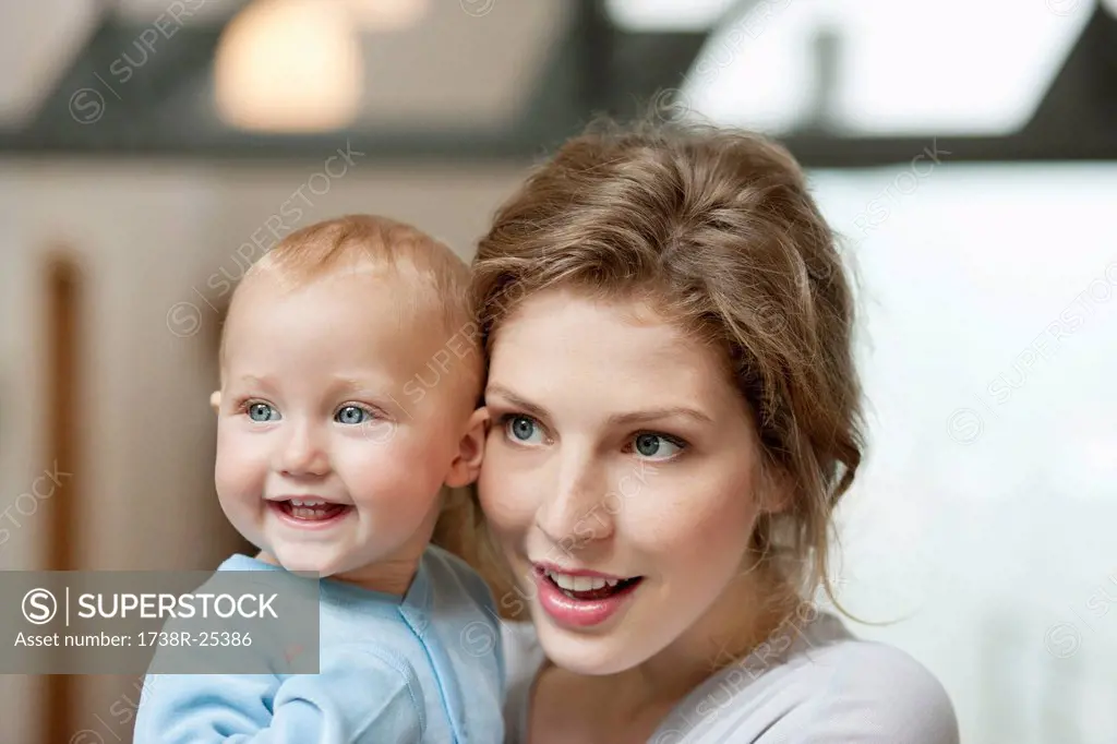 Close_up of a woman with her baby girl