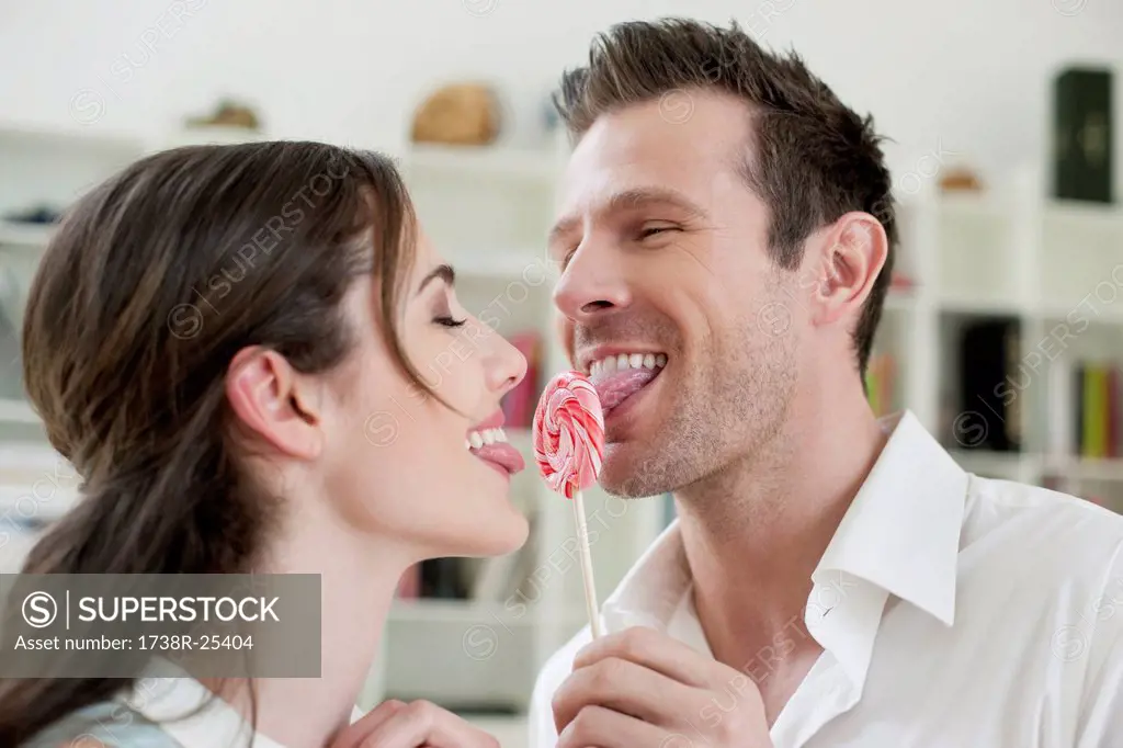 Couple sharing a candy