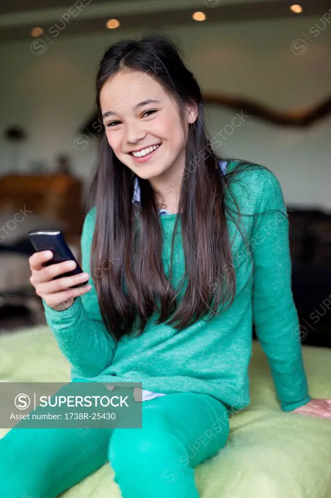 Portrait of a girl using a mobile phone