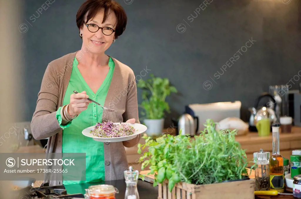 Portrait of a woman tasting food