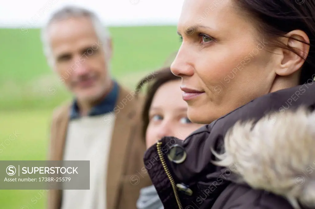 Close_up of a woman with her family