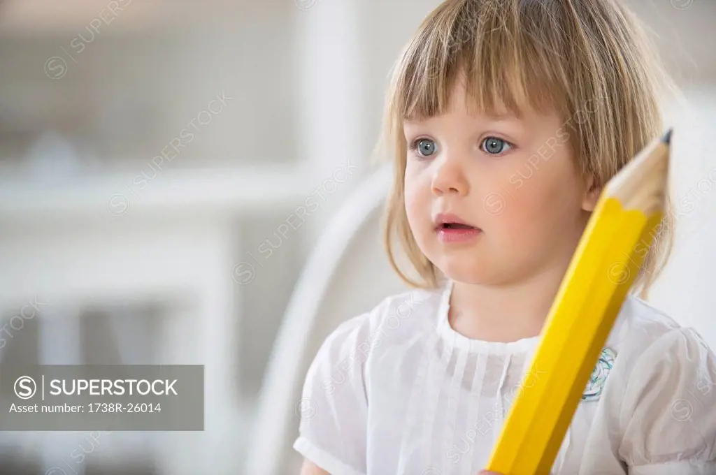 Girl with a big pencil