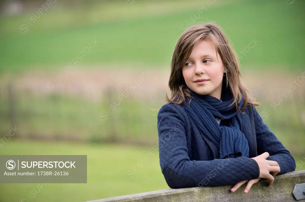 Girl thinking in a farm