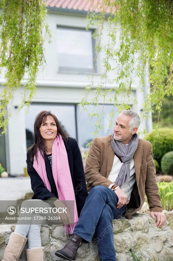 Romantic couple sitting in a garden