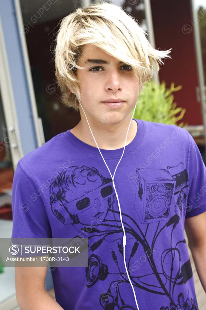 Portrait of a teenage boy with earphones