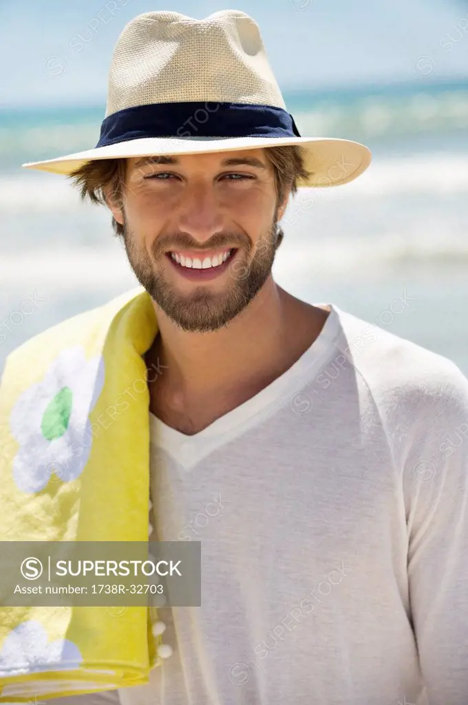 Portrait of a man smiling on the beach