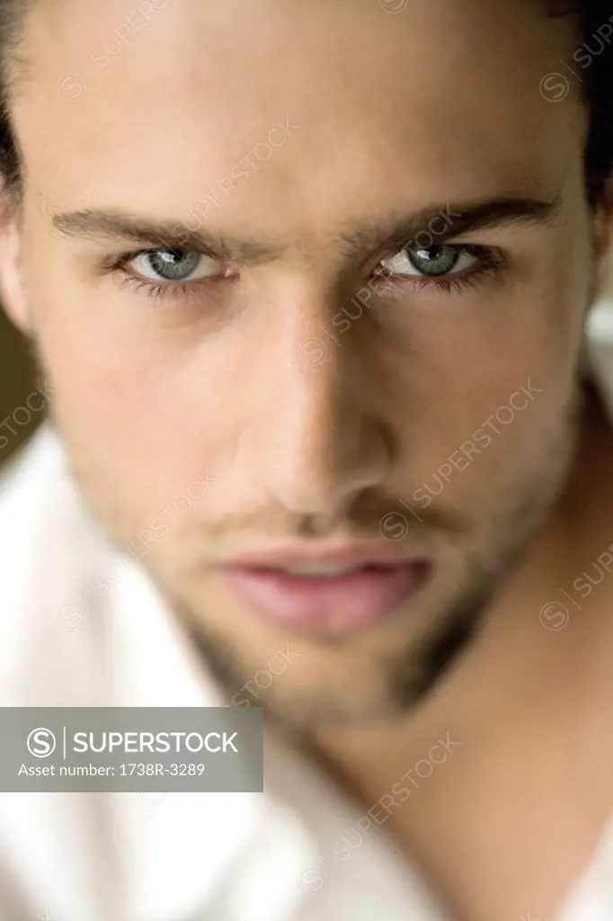 Portrait of a young man looking at the camera