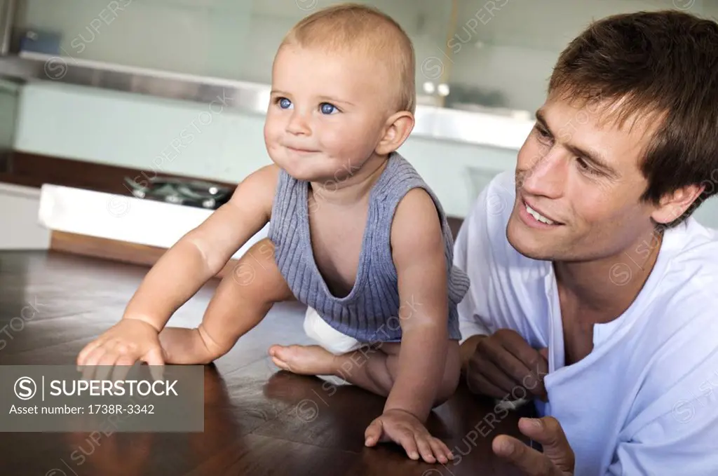 Father and son in kitchen, indoors