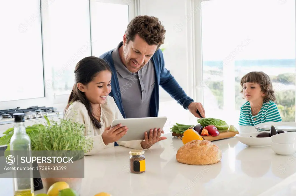 Man preparing food for his children