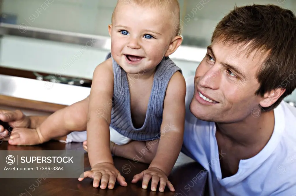 Father and son in kitchen, indoors
