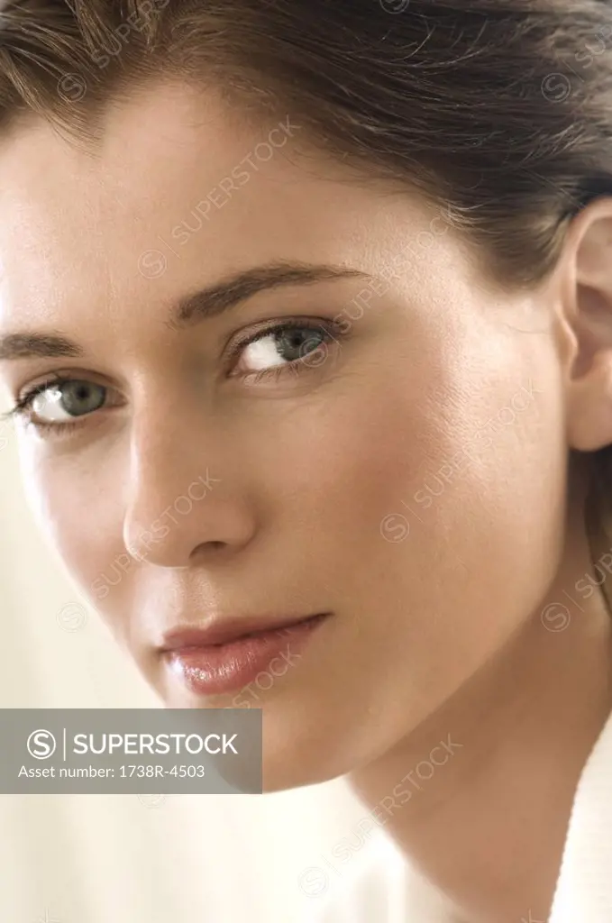 Portrait of young woman loooking at camera