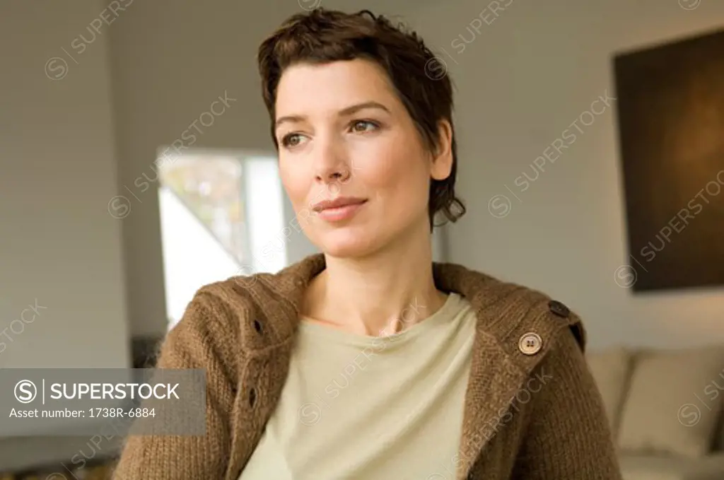 Mid adult woman thinking