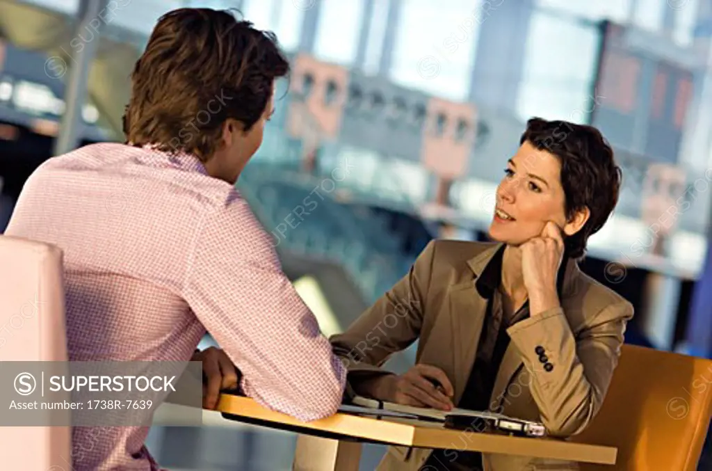 Businessman and a businesswoman in a meeting