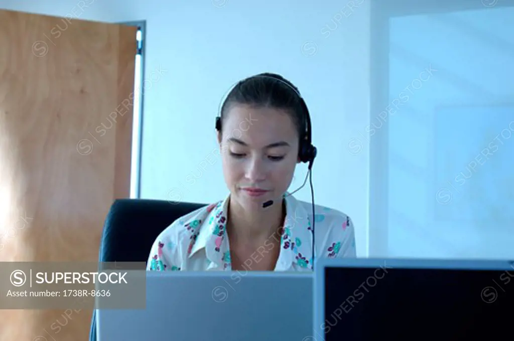 Young businesswoman wearing headset