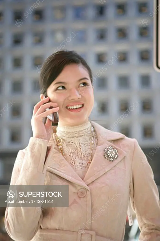 Young Asian woman using a cell phone