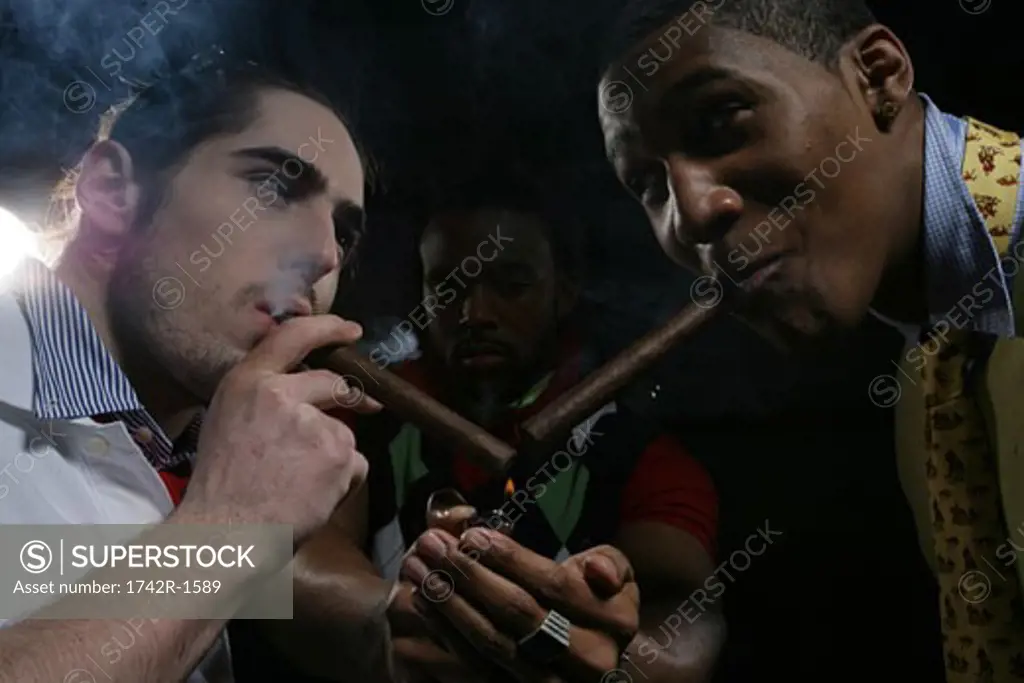 Three young men smoking