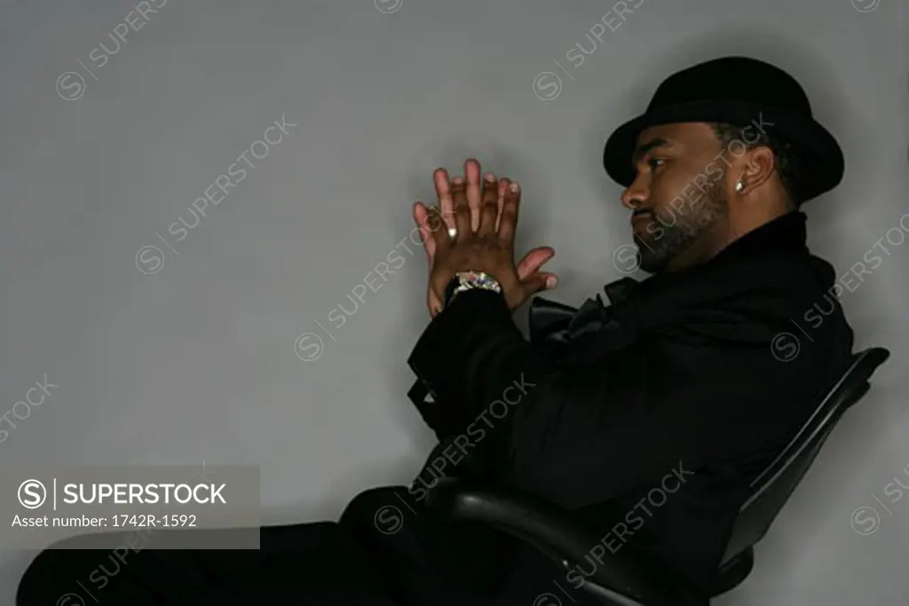 African-American man sitting in a chair
