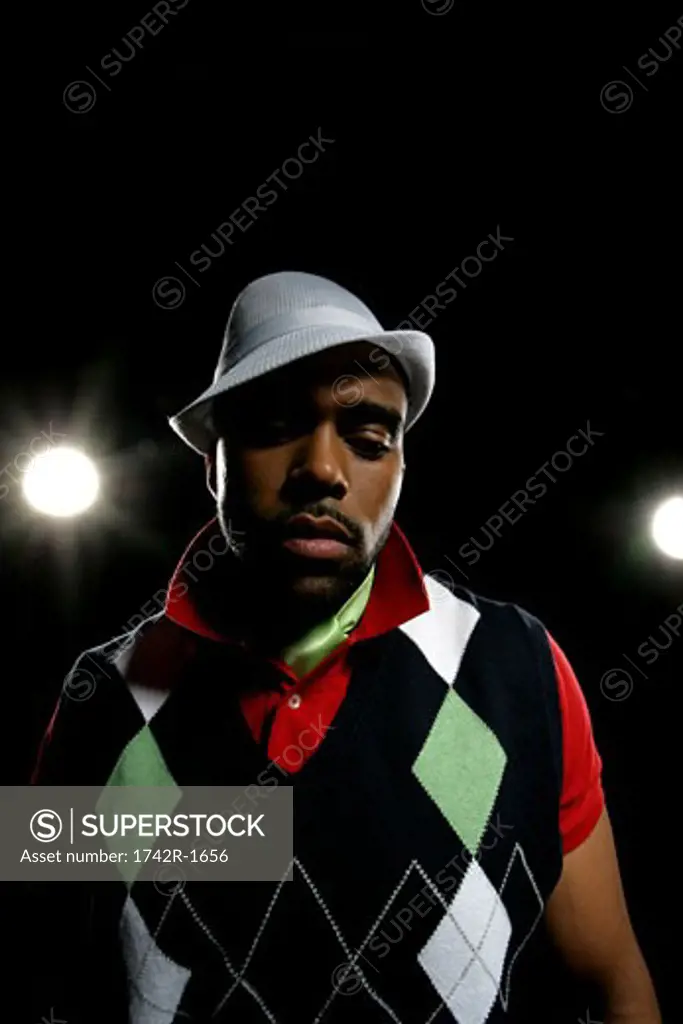 Young African-American man wearing a stylish hat