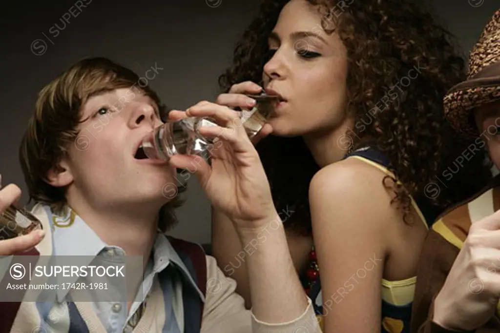 View of a man and woman enjoying a drink.