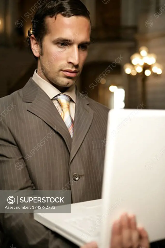 View of a businessman with his laptop