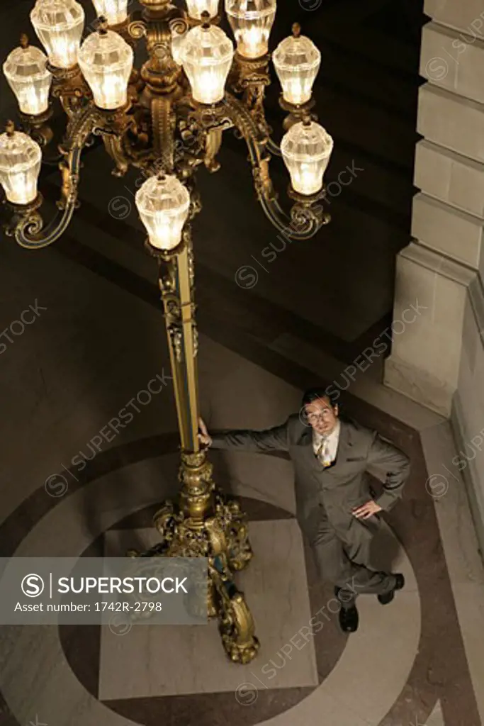 View of a businessman near lamps.