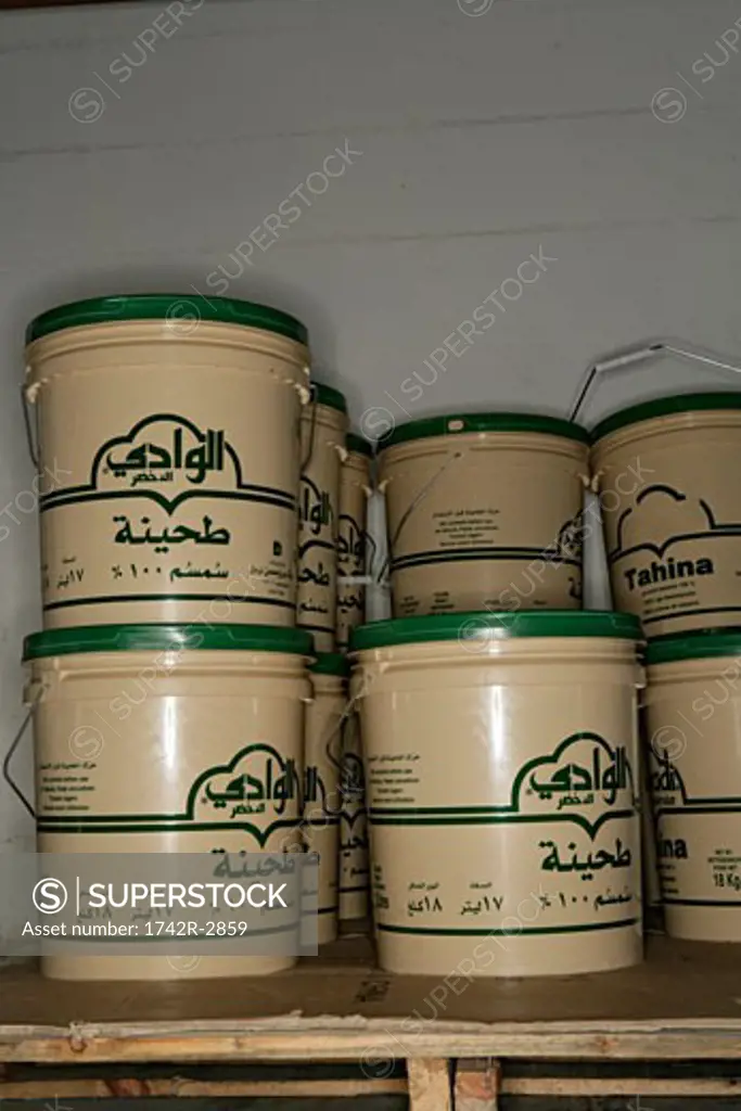 View of containers arranged on shelves.
