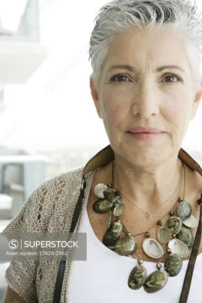 View of a mature woman looking at camera.