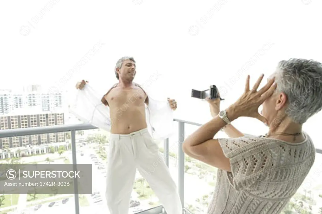 Mature couple taking pictures