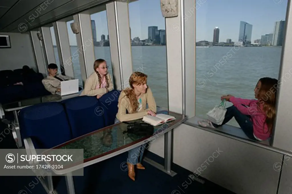 Passengers inside a ferryboat